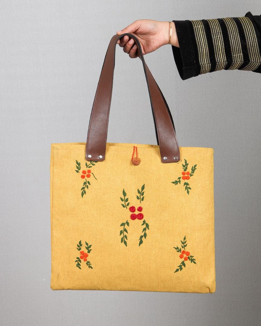 Golden Blossom floral embroidery.