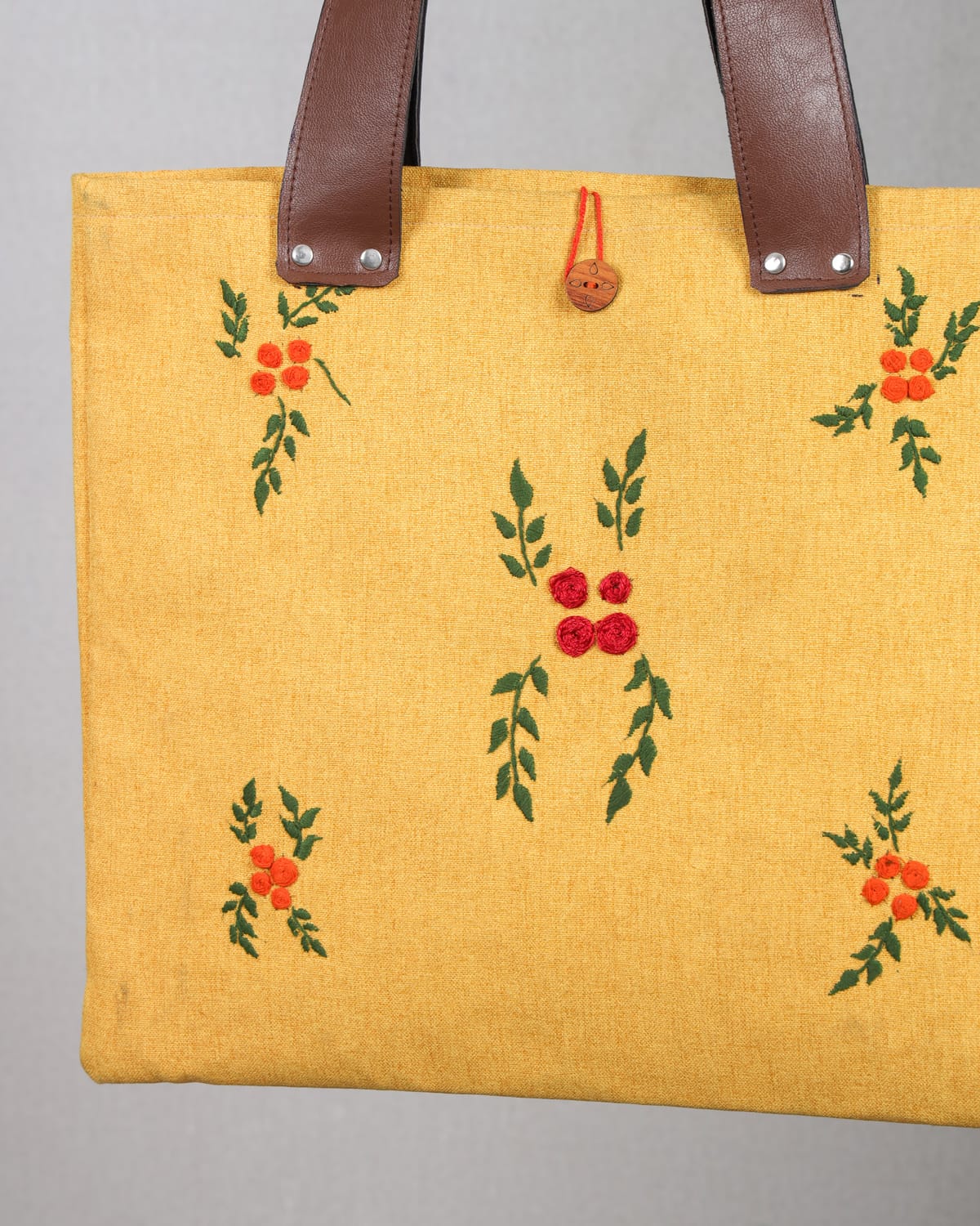 Golden Blossom floral embroidery.
