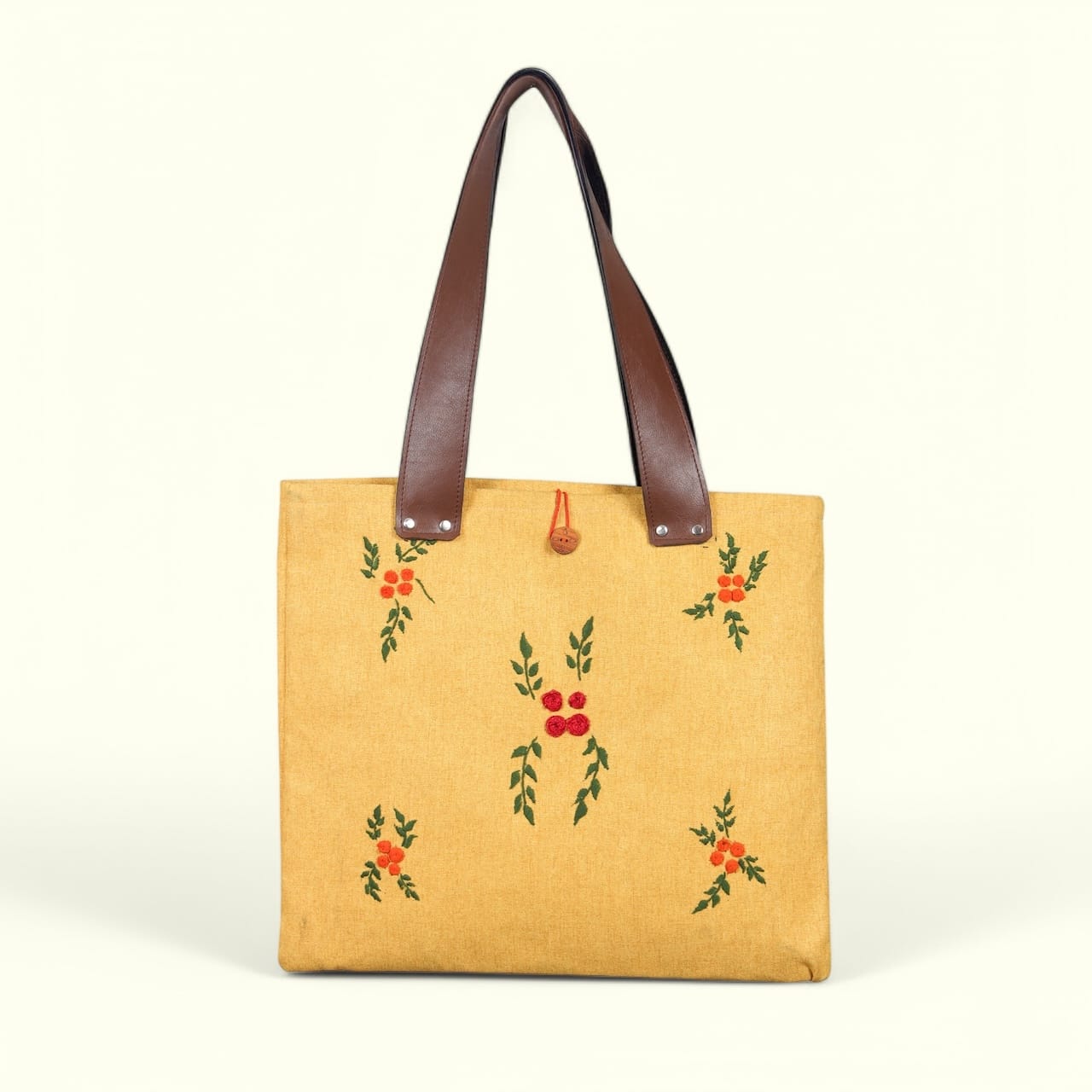 Golden Blossom floral embroidery.
