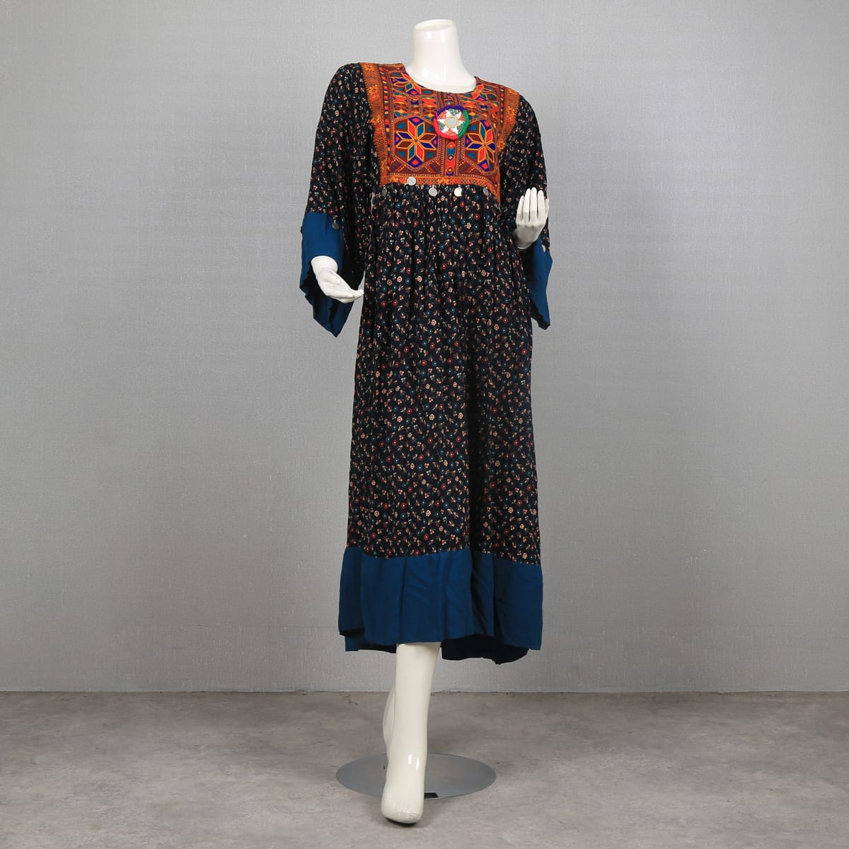 Traditional Afghan Dress with Colorful Embroidery and Floral Print