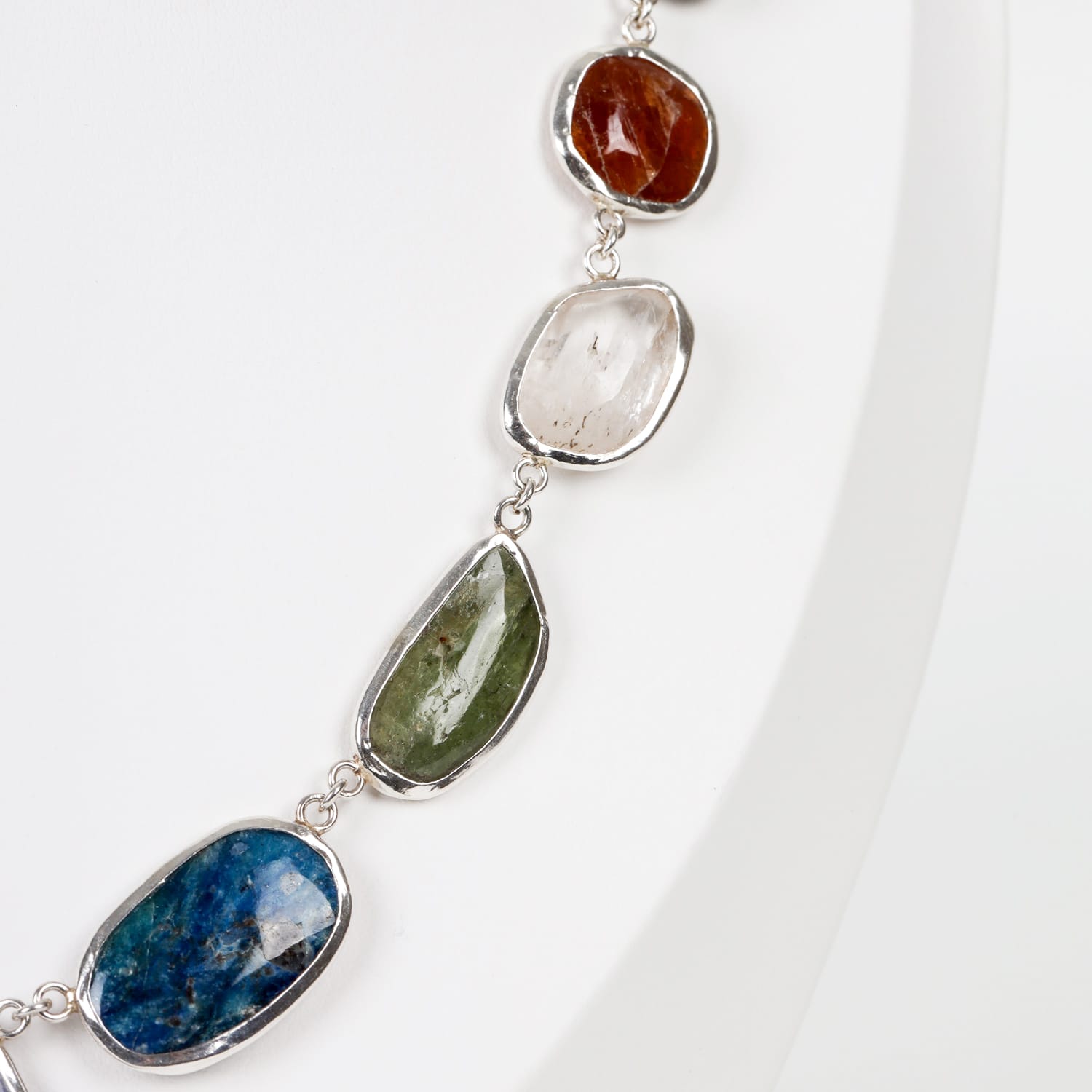 Aurora Gems Pendant with Kunzite, Afghanite, Peridot, and Acmite in Silver