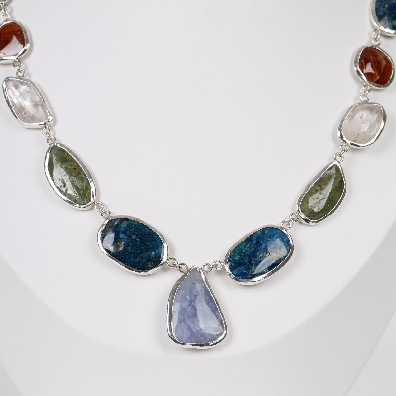 Aurora Gems Pendant with Kunzite, Afghanite, Peridot, and Acmite in Silver