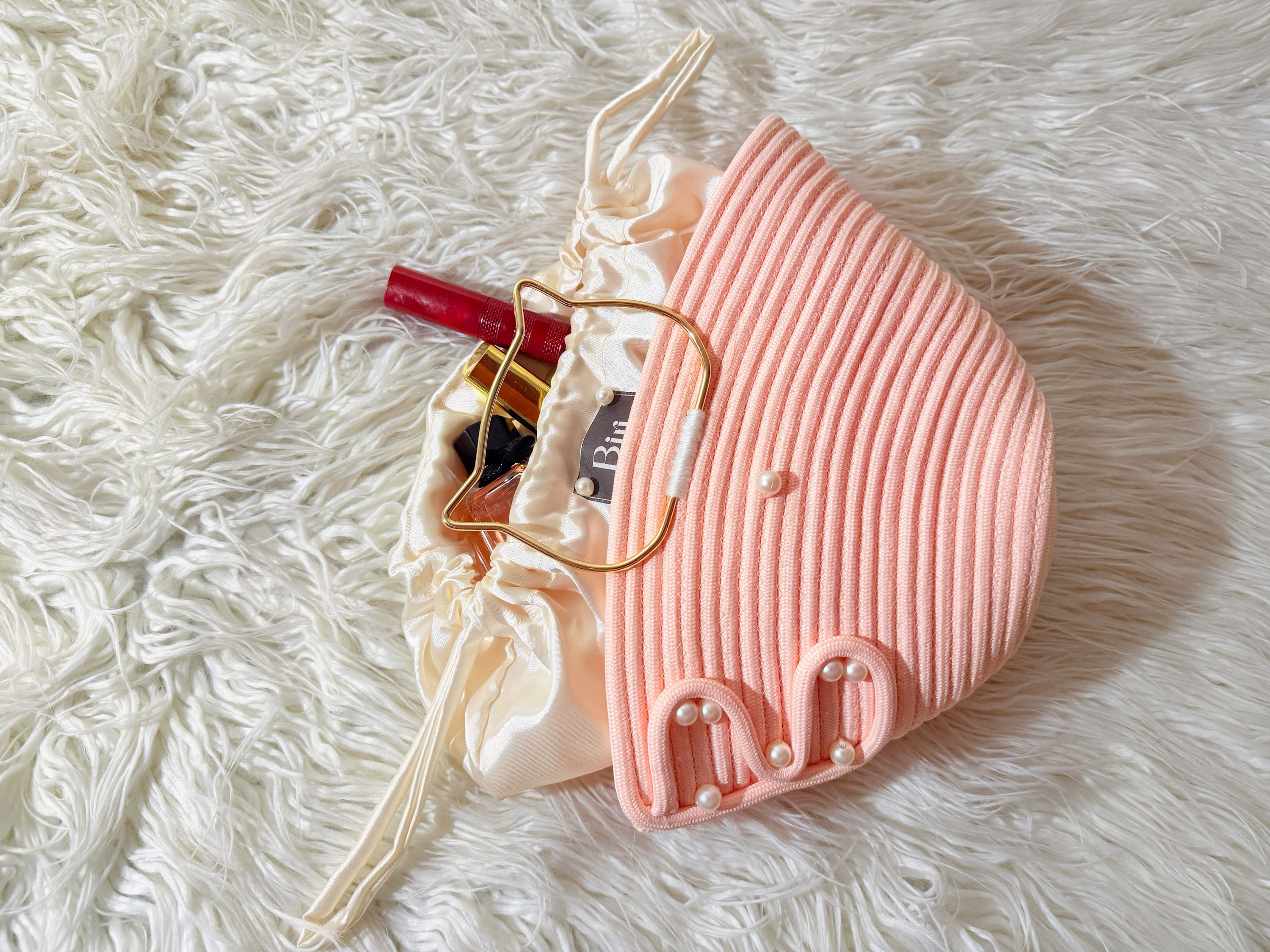The Biri Artisan Pearl-Drop Handbag: Handwoven Blush Pink Edition