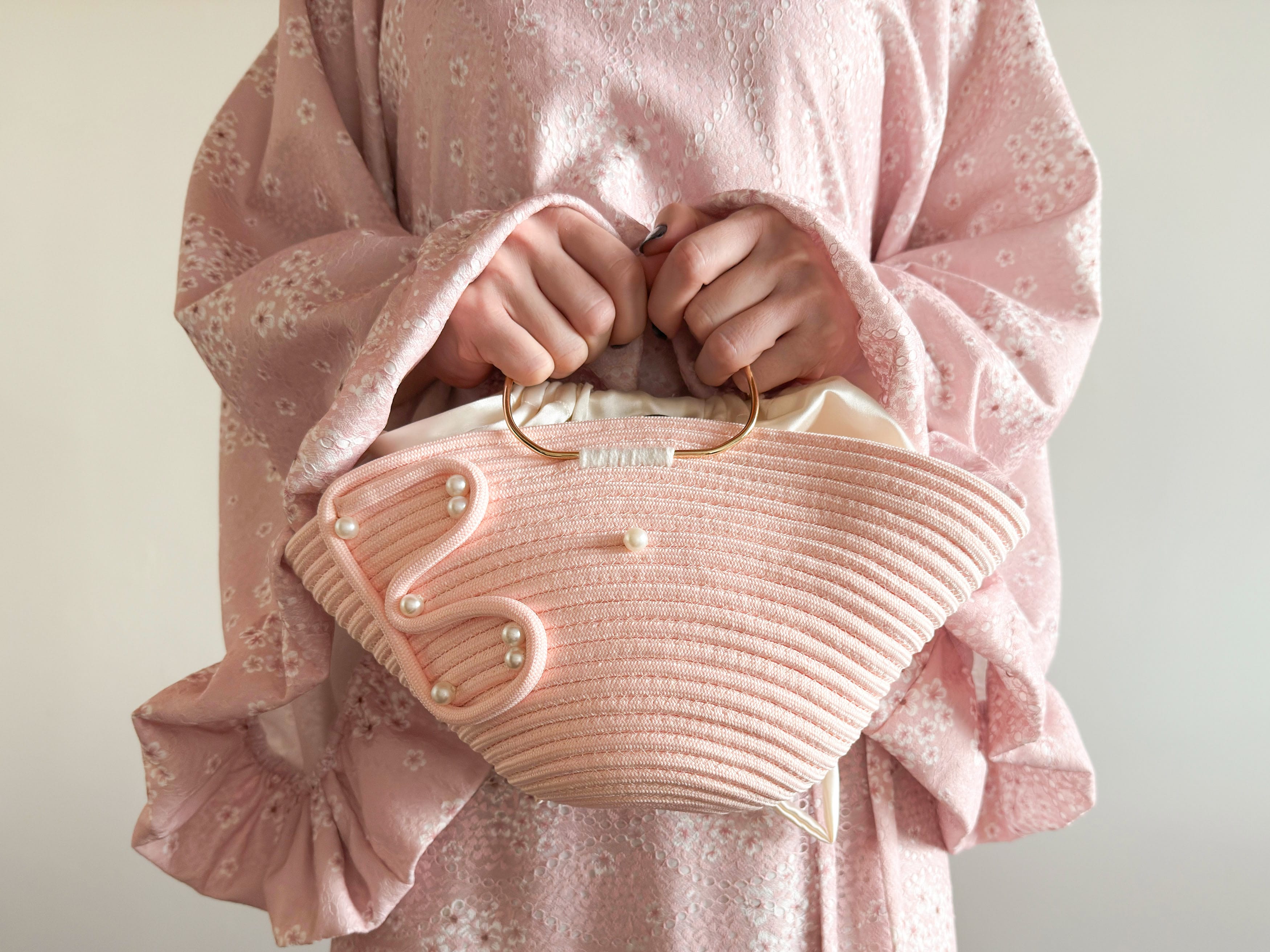 The Biri Artisan Pearl-Drop Handbag: Handwoven Blush Pink Edition