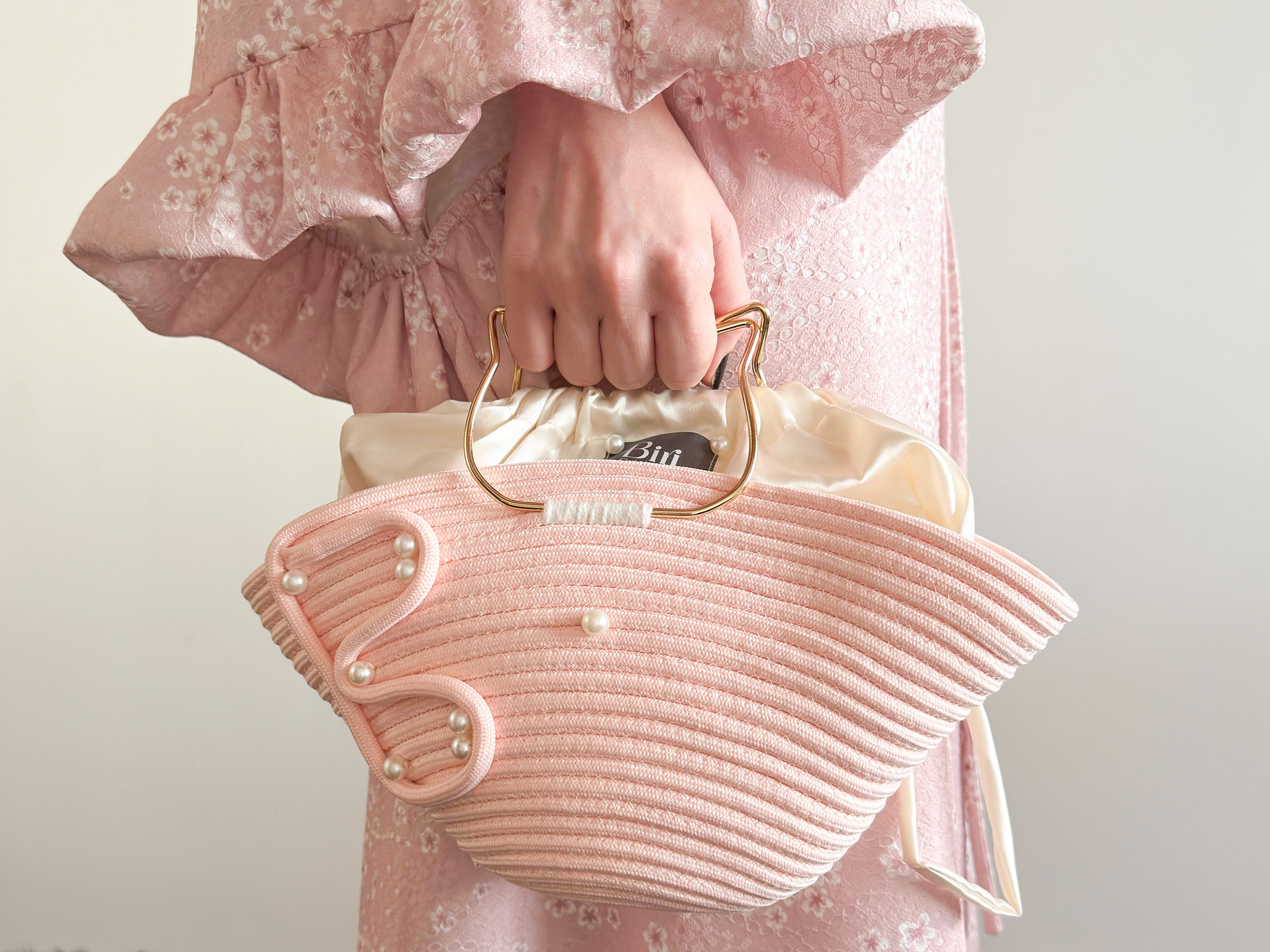 The Biri Artisan Pearl-Drop Handbag: Handwoven Blush Pink Edition
