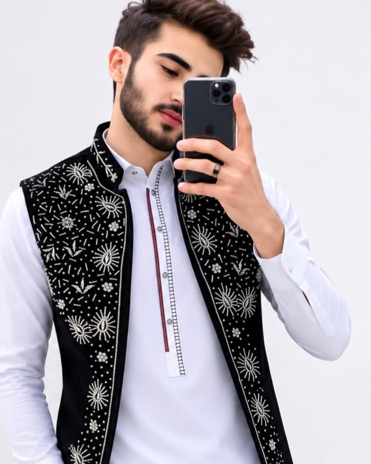 Afghan Man’s Traditional White Outfit with Black Embroidered Waistcoat